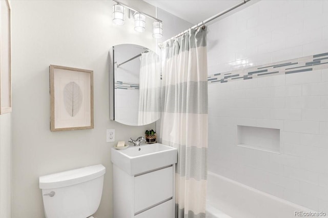6314 Brooks Dr, Arvada, CO 80004 - bathroom featuring shower / bath combo with shower curtain, toilet, and vanity