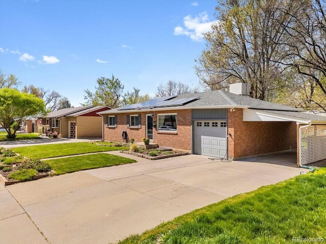 6314 Brooks Dr, Arvada, CO 80004 - single story home with an attached garage, driveway, a front lawn, roof mounted solar panels, and a chimney
