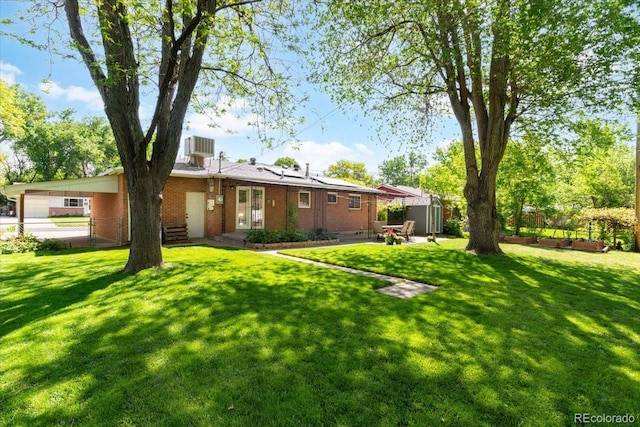 6314 Brooks Dr, Arvada, CO 80004 - view of yard with a shed