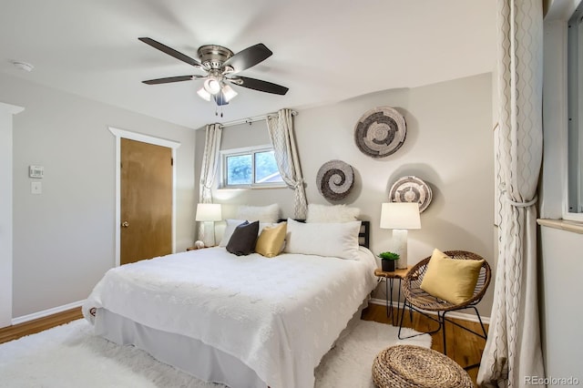 6314 Brooks Dr, Arvada, CO 80004 - bedroom with wood finished floors and ceiling fan