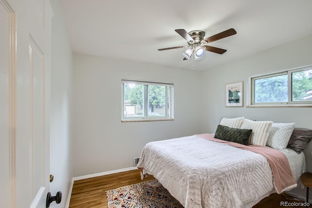 6314 Brooks Dr, Arvada, CO 80004 - bedroom featuring wood finished floors and ceiling fan