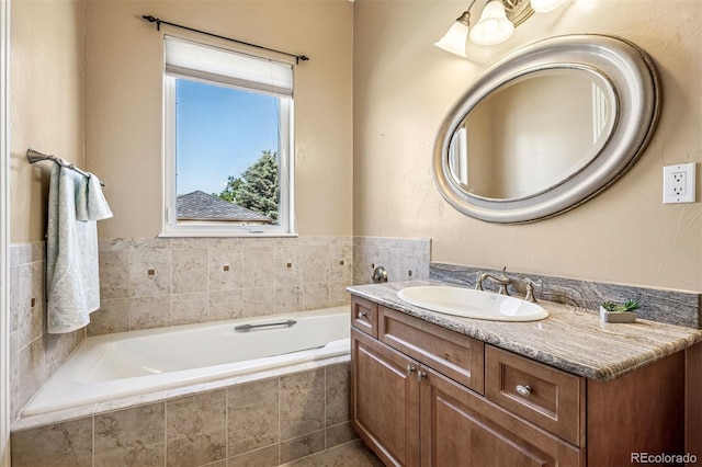 13962 W 76th Ln, Arvada, CO 80005 - full bathroom featuring vanity and a garden tub