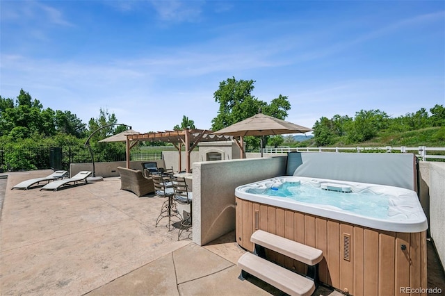 13962 W 76th Ln, Arvada, CO 80005 - view of patio with a hot tub and a pergola