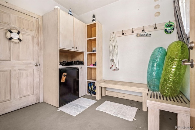 13962 W 76th Ln, Arvada, CO 80005 - mudroom with independent washer and dryer and concrete flooring