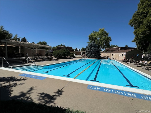 view of pool featuring a patio area