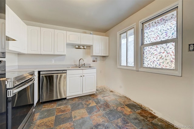 kitchen with white cabinets, sink, and stainless steel appliances