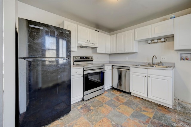 kitchen with stainless steel appliances, white cabinetry, and sink