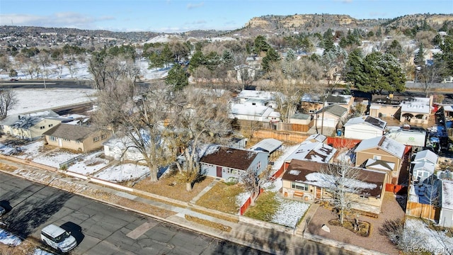 birds eye view of property featuring a mountain view