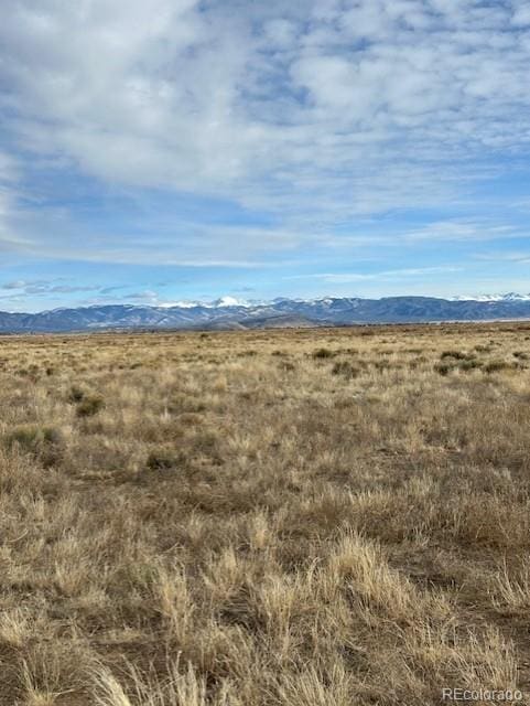 view of mountain feature featuring a rural view