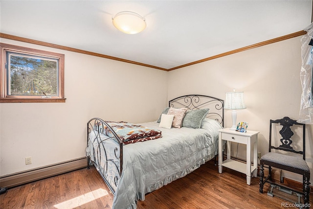 bedroom with wood finished floors, ornamental molding, and a baseboard heating unit