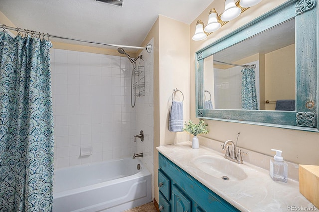 full bath with vanity, shower / bath combination with curtain, and visible vents