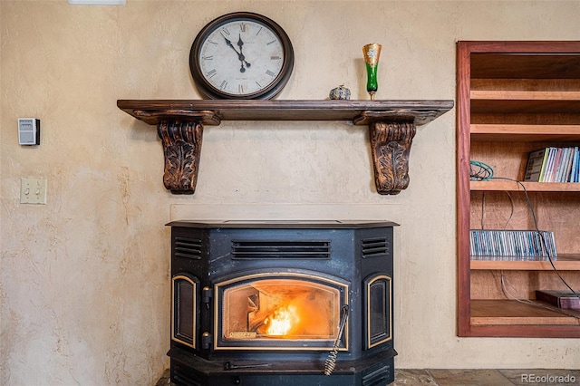 interior details featuring a wood stove