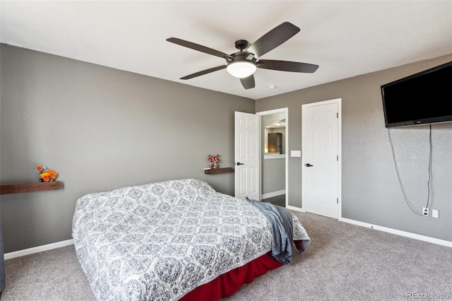 bedroom with a ceiling fan, carpet, and baseboards
