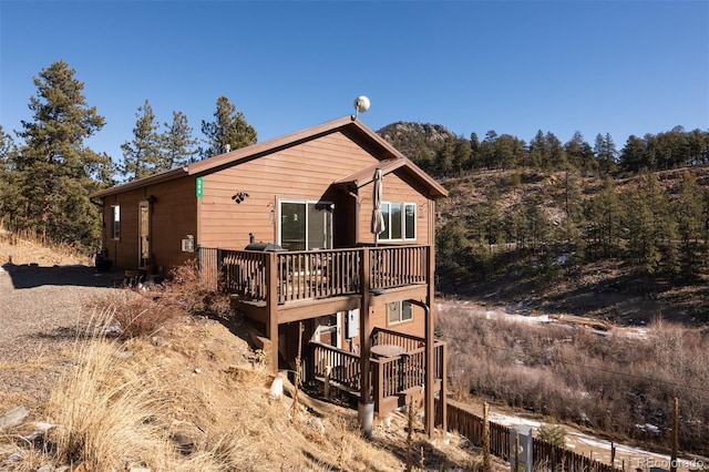 exterior space featuring a wooden deck