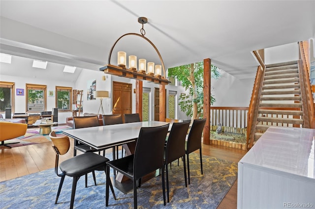 10886 E Crestline Cir, Englewood, CO 80111 - dining space with wood finished floors and stairway