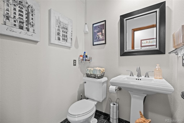 10886 E Crestline Cir, Englewood, CO 80111 - bathroom featuring toilet and baseboards