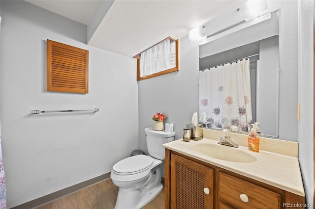 10886 E Crestline Cir, Englewood, CO 80111 - bathroom with vanity and wood finished floors