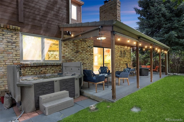 10886 E Crestline Cir, Englewood, CO 80111 - deck at dusk featuring outdoor lounge area and a yard