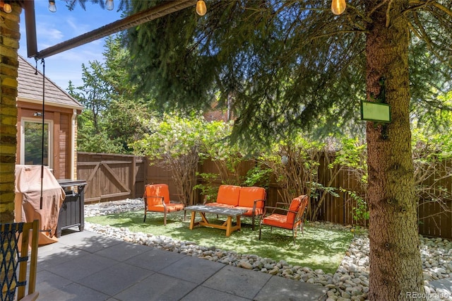 10886 E Crestline Cir, Englewood, CO 80111 - fenced backyard featuring a patio and a gate