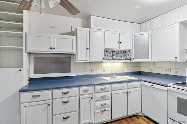 kitchen with white cabinets, white appliances, sink, and ceiling fan