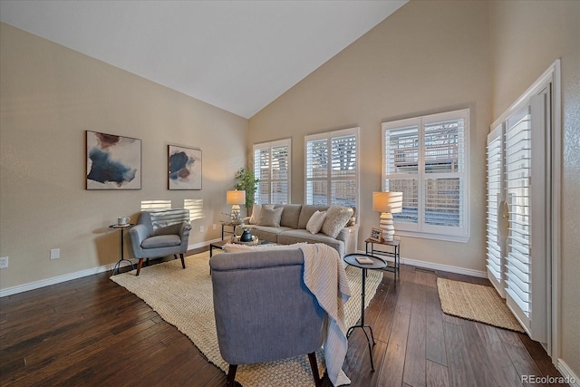 living room featuring high vaulted ceiling, baseboards, and dark wood-style flooring