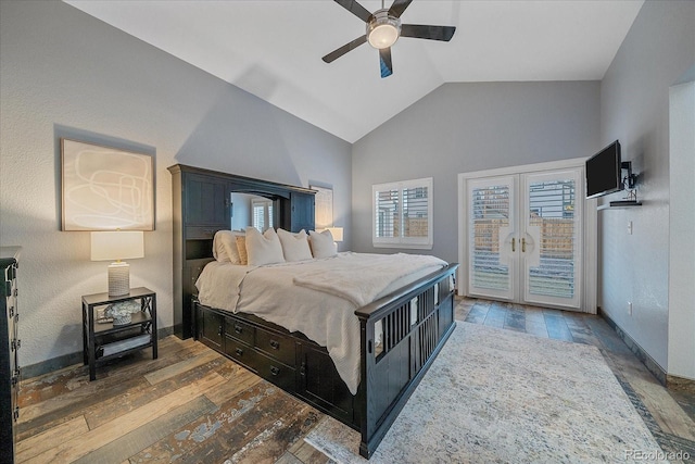 bedroom featuring baseboards, lofted ceiling, french doors, wood finished floors, and access to outside