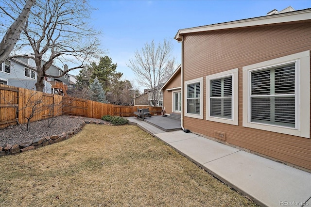 view of yard with a fenced backyard