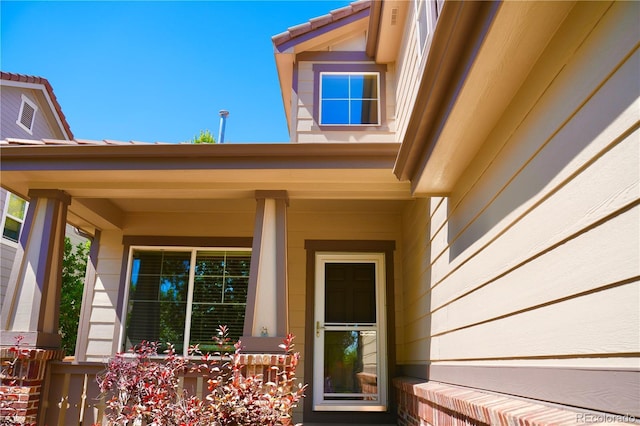 4788 Laurelglen Ln, Highlands Ranch, CO 80130 - view of exterior entry featuring covered porch