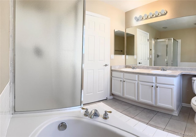 4788 Laurelglen Ln, Highlands Ranch, CO 80130 - full bathroom featuring a shower stall, double vanity, a bath, and tile patterned floors