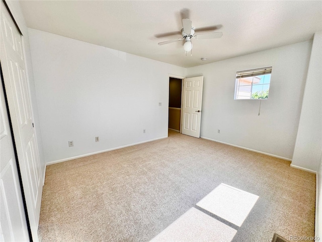 4788 Laurelglen Ln, Highlands Ranch, CO 80130 - unfurnished bedroom with light colored carpet, a closet, and ceiling fan