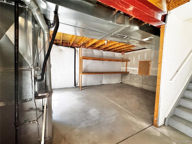 4788 Laurelglen Ln, Highlands Ranch, CO 80130 - unfinished basement featuring stairs and heating unit