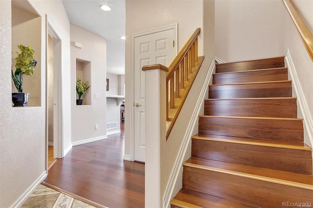 3000 E 112th Ave Unit 86, Northglenn, CO 80233 - stairs with wood finished floors, recessed lighting, and baseboards