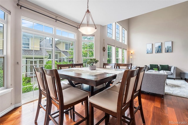 3000 E 112th Ave Unit 86, Northglenn, CO 80233 - dining room featuring hardwood / wood-style flooring and baseboards