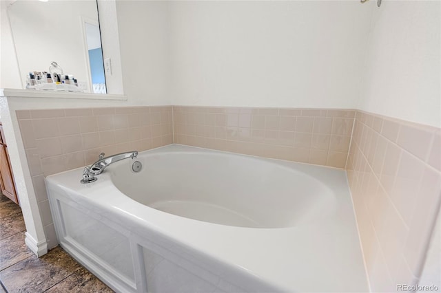3000 E 112th Ave Unit 86, Northglenn, CO 80233 - bathroom with a bath and vanity