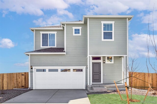 17942 E 94th Pl, Commerce City, CO 80022 - view of front of house featuring driveway and a garage