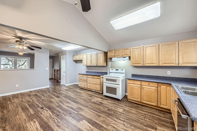kitchen featuring a ceiling fan, light brown cabinets, double oven range, dishwasher, and vaulted ceiling