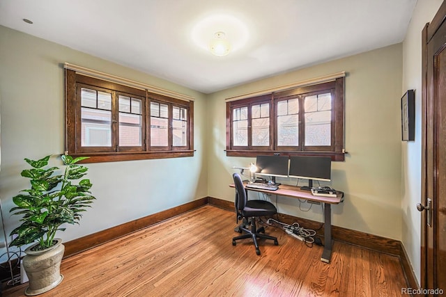 office featuring wood finished floors and baseboards