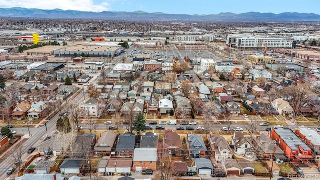 birds eye view of property featuring a mountain view