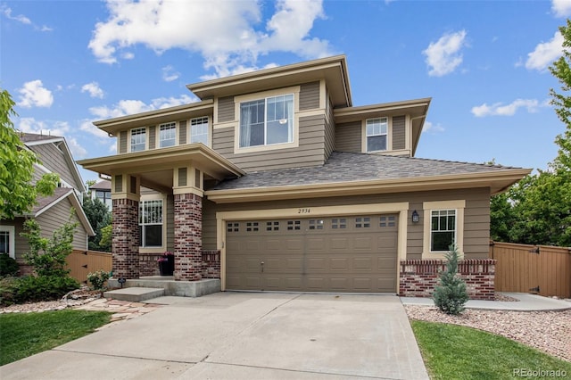2934 Braeburn Way, Highlands Ranch, CO 80126 - prairie-style home featuring brick siding, driveway, a garage, and a shingled roof