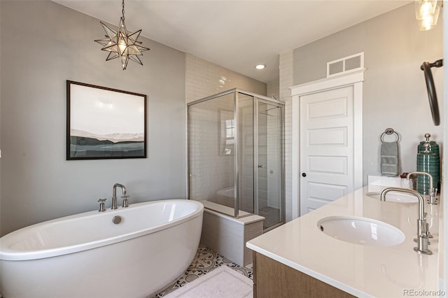 5880 Beeler Ct, Denver, CO 80238 - full bath with a stall shower, double vanity, a freestanding bath, and recessed lighting