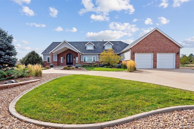 view of front of home featuring a garage and a front lawn