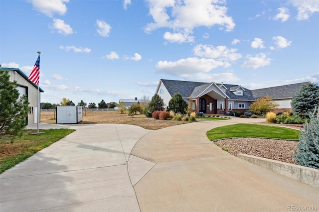 29850 E 167th Pl, Brighton, CO 80603 - surrounding community featuring curved driveway, a gate, and fence