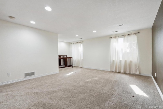 29850 E 167th Pl, Brighton, CO 80603 - empty room with recessed lighting, light carpet, baseboards, and a smoke detector
