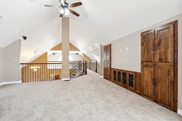 29850 E 167th Pl, Brighton, CO 80603 - unfurnished living room featuring a ceiling fan, carpet floors, and lofted ceiling