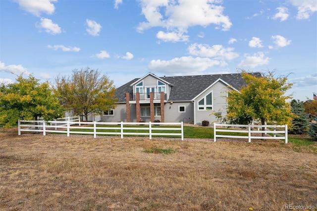 view of front of house with a front lawn