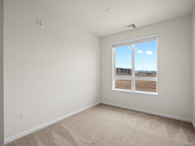 view of carpeted spare room