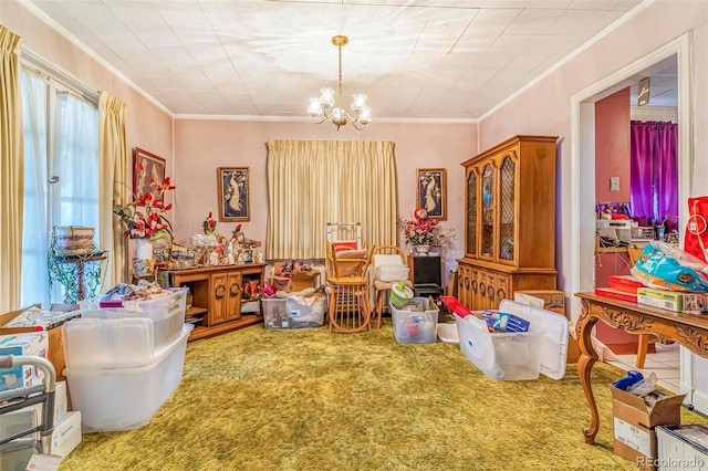 2421 N York St, Denver, CO 80205 - carpeted dining room with ornamental molding and a chandelier