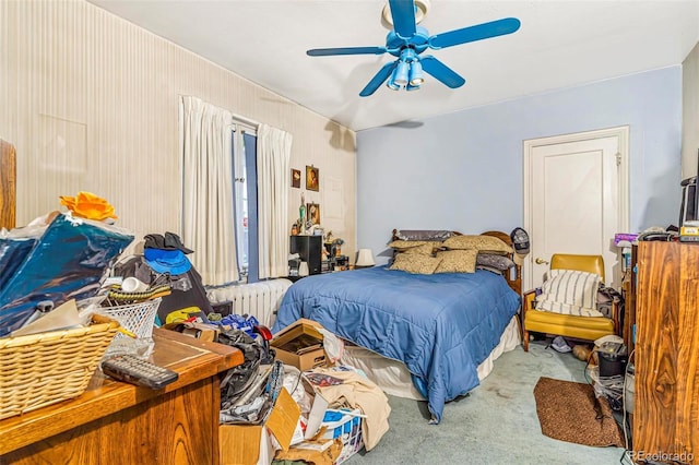 2421 N York St, Denver, CO 80205 - bedroom with radiator heating unit, carpet flooring, and ceiling fan