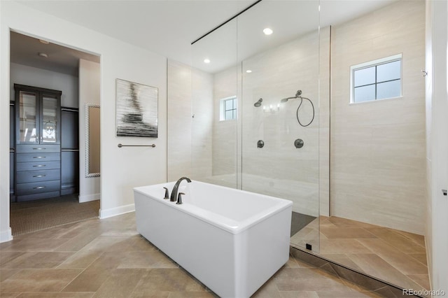 27381 E Lakeview Dr, Aurora, CO 80016 - full bath featuring a walk in shower and a freestanding bath