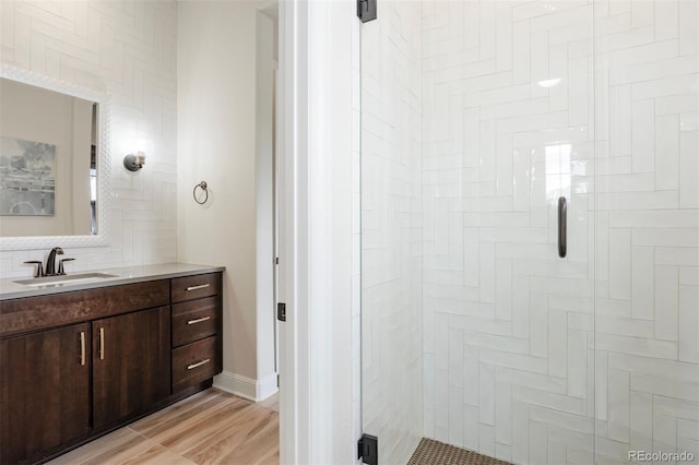 27381 E Lakeview Dr, Aurora, CO 80016 - full bath with a stall shower, vanity, and decorative backsplash